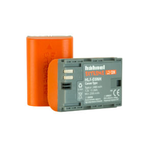 The picture shows two Hähnel Extreme HLX-E6NH 2400mAh (Canon LP-E6NH) batteries – one has an orange rear section and the other has a grey label showing, amongst other things, 7.2 V and 2400mAh.