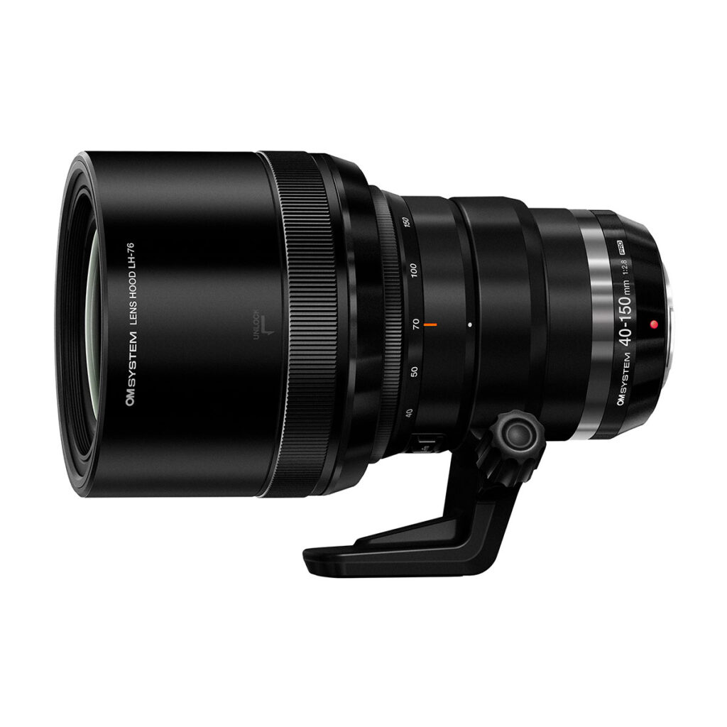 om_40-150mm_02 Musta OM System M.Zuiko Digital ED 40-150mm f/2.8 PRO -objektiivi jalustapannalla, sivukuva valkoista taustaa vasten. 200€ Cashback tarjous.