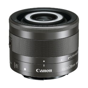 Canon_EF-M_28mm_f_3_5_Macro_IS_STM_001 The Canon EF-M 28mm f/3.5 Macro IS STM lens with textured focusing ring, marked "Canon MACRO 28mm" and "SUPER MACRO", is visible against a white background.