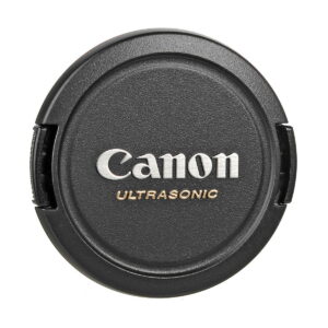 Canon_EF-S_10-22mm_f_3_5-4_5_USM_004 The photo shows a lens cover with a black textured surface and attachable side grips for the Canon EF-S 10-22mm f/3.5-4.5 USM lens, against a white background.