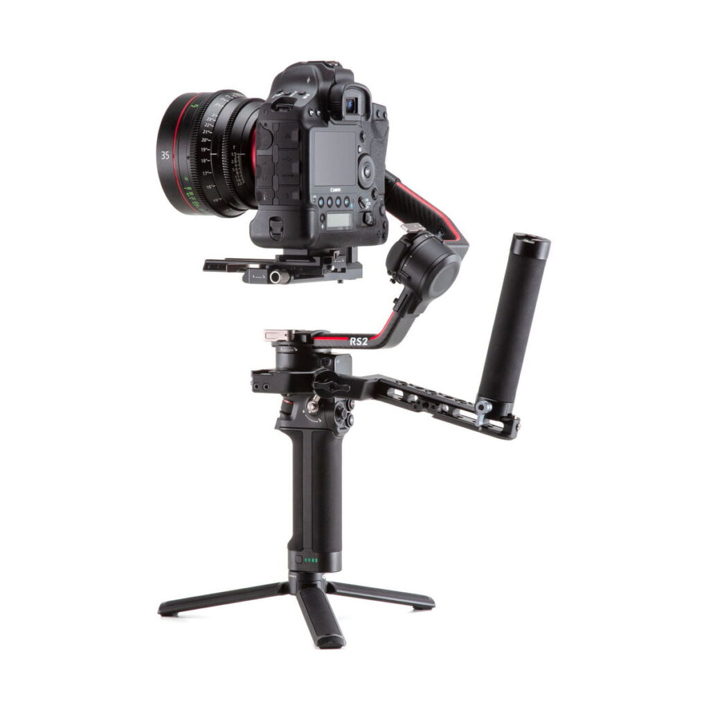 DJI-R-Twist-Grip-Dual-Handle-for-RS-2-RSC-2-01 The DJI R Twist Grip Dual Handle for RS 2 & RSC 2 is a black handheld gimbal accessory with tripod stand designed to provide stable footage and smooth video capture for professional DSLR cameras.