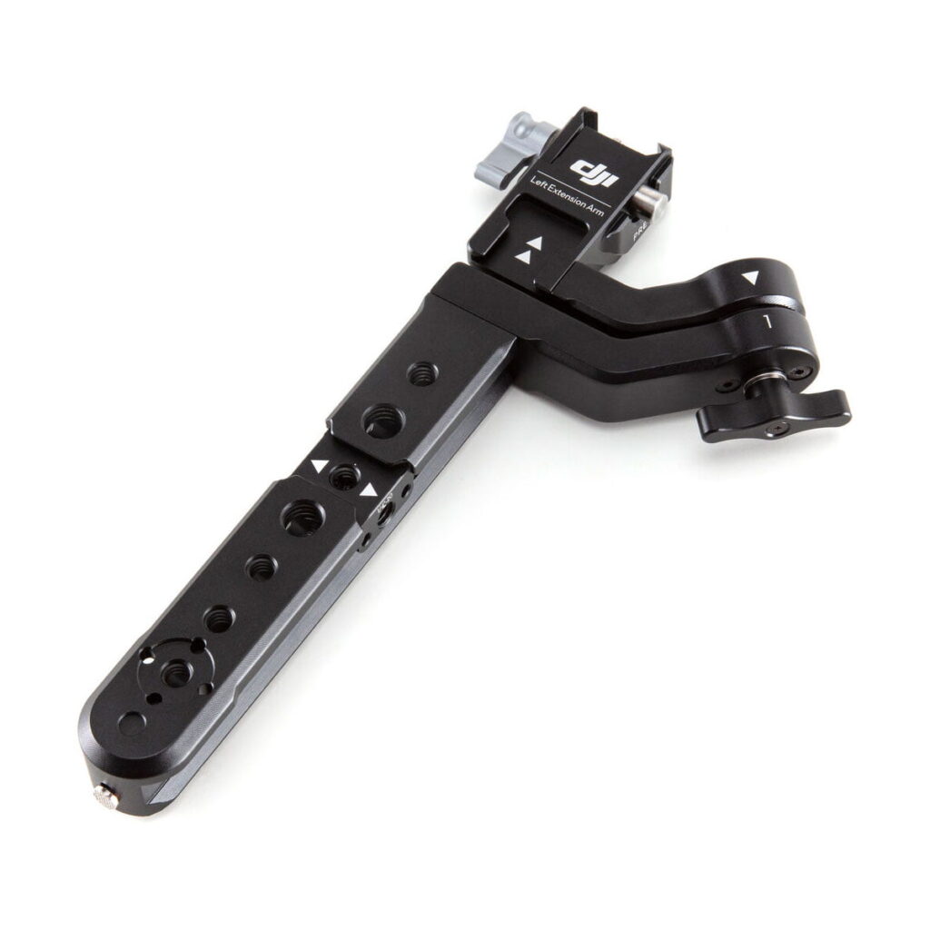 DJI-R-Twist-Grip-Dual-Handle-for-RS-2-RSC-2-02 The DJI R Twist Grip Dual Handle for RS 2 & RSC 2 is a black metal camera grip with multiple screw holes, adjustment points and the DJI logo near the top, designed for attaching accessories to camera rigs or gimbals.
