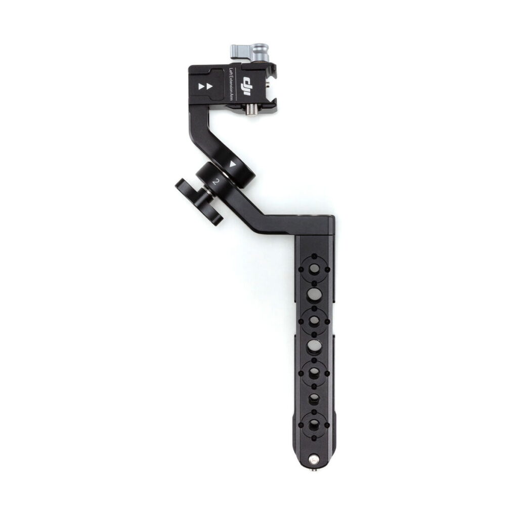 DJI-R-Twist-Grip-Dual-Handle-for-RS-2-RSC-2-03 The DJI R Twist Grip Dual Handle for RS 2 & RSC 2 is a black, L-shaped metal mounting bracket with multiple round holes and adjustment knobs designed for attaching accessories or equipment.
