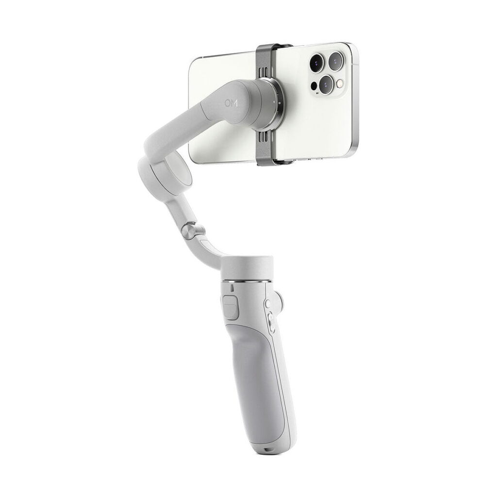 DJi_OM_5_Sunset_Grey_006 DJI OM 5 vakaaja älypuhelimille - Harmaa on harmaa käsikäyttöinen älypuhelimen gimbaali, joka vakauttaa puhelimesi maisematilassa varmistaen sujuvan videokuvauksen ja valokuvauksen.
