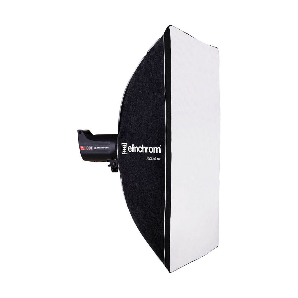 Elinchrom_Rotalux_Squarebox_100cm_001 Studio luminaire with a large Elinchrom Rotalux Squarebox 100cm softbox diffuser mounted on the side against a white background.