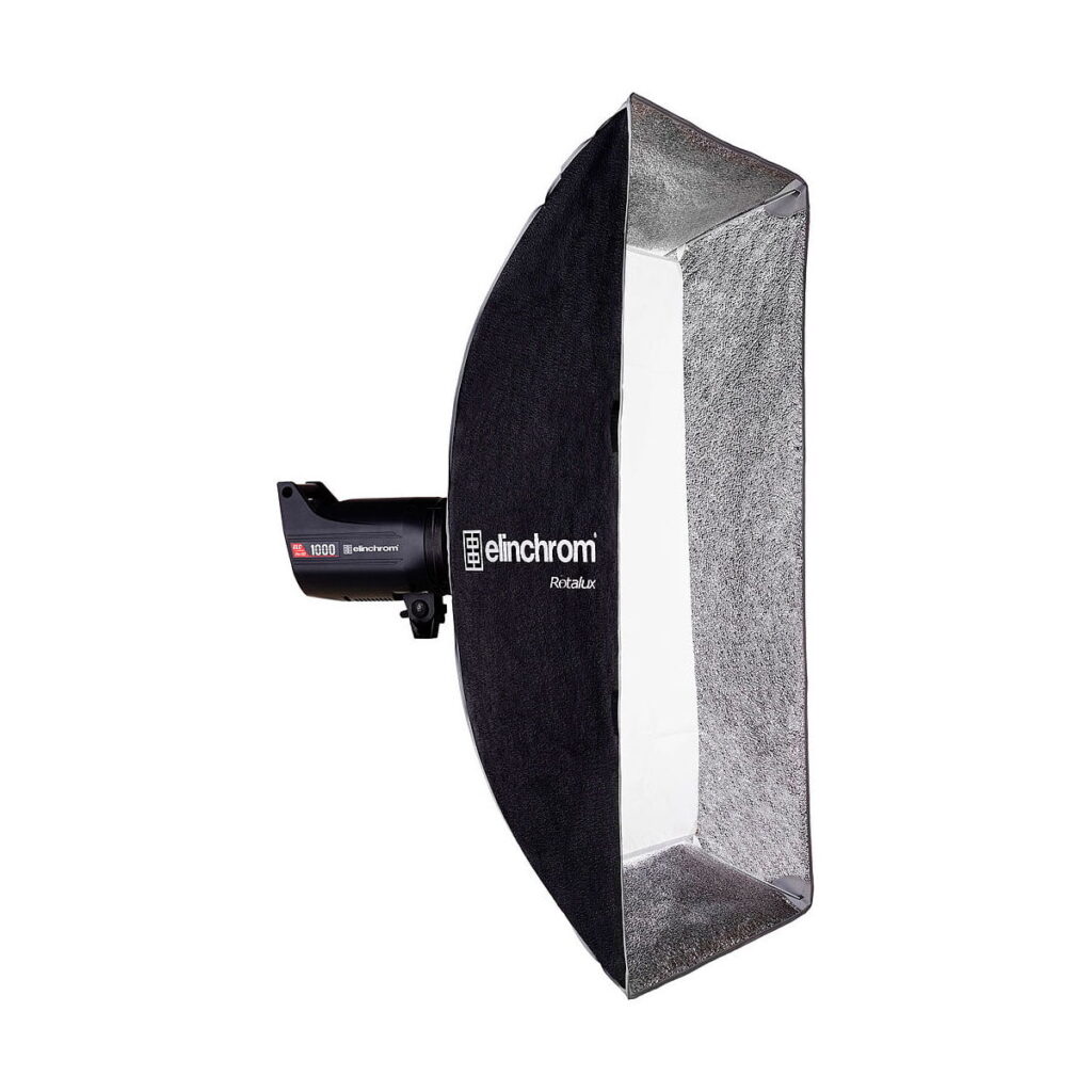 Elinchrom_Rotalux_Squarebox_100cm_003 Elinchrom Rotalux Squarebox 100cm, a black rectangular softbox with silver interior, is mounted on a studio strobe and photographed against a white background.
