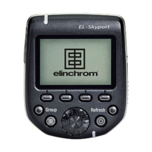 Elinchrom_Transmitter_Pro_001 Black Elinchrom Transmitter Pro - Canon, with a display showing the Elinchrom logo and five labelled control buttons for grouping and updating.
