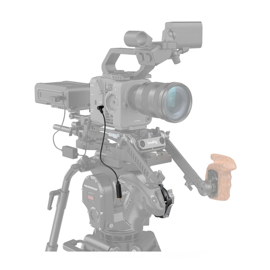 SmallRig_Handgrip_Rosette_Adapter_for_Sony_FX6_3403_006 The SmallRig 3403 Handgrip Rosette Adapter for Sony FX6 is attached to a professional camcorder assembly with lens, external monitor, wooden side grip and accessories mounted on a tripod against a white background.