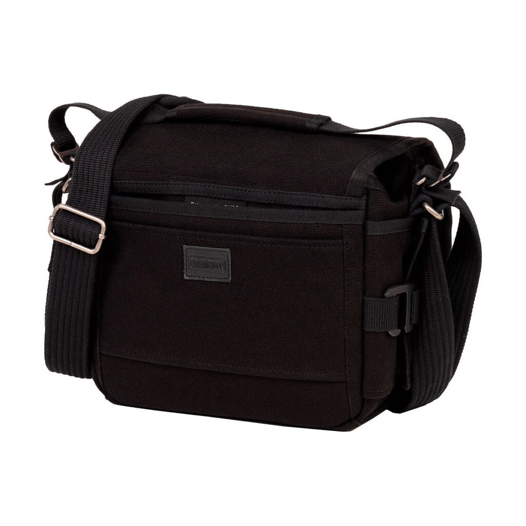 Think_Tank_Retrospective_5_V2_0-Musta_002 Think Tank Retrospective 5 V2.0 - Black is a black shoulder bag with adjustable strap, metal buckles, top handle and front pocket - ideal for carrying personal belongings or camera equipment.
