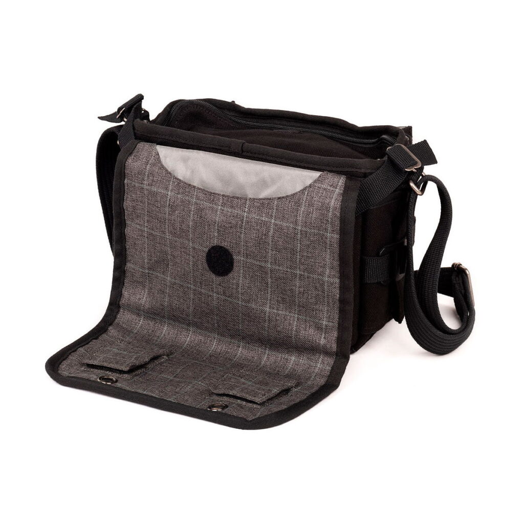 Think_Tank_Retrospective_5_V2_0-Musta_003 The Think Tank Retrospective 5 V2.0 - Black is a grey checked shoulder bag with a long black strap, a spacious interior and a front flap with button closure that appears on a white background.