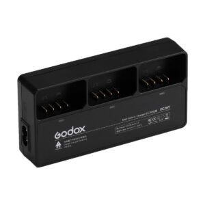 godox_vc26t Black Godox VC26T triple charger AD100 / Godox V1 charger with three charging slots, labelled indicators and a left-hand socket designed for camera batteries.