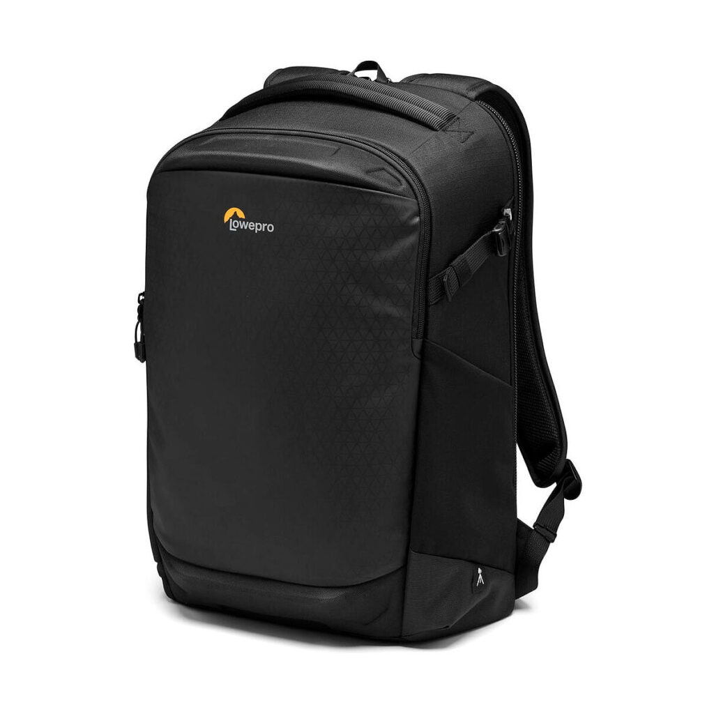 Lowepro_Flipside_400_AW_III-Musta_002 The Lowepro Flipside 400 AW III is a stylish black backpack with top handle, padded shoulder straps, zippered front compartment and Lowepro logo at the top of the front panel.