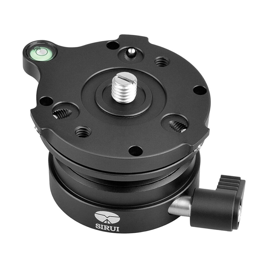 Sirui_LE-60_Leveling_Base_001 The Sirui LE-60 levelling stand is a black tripod accessory with a built-in bubble level, top fixing screw, several threaded holes and side locking knob.