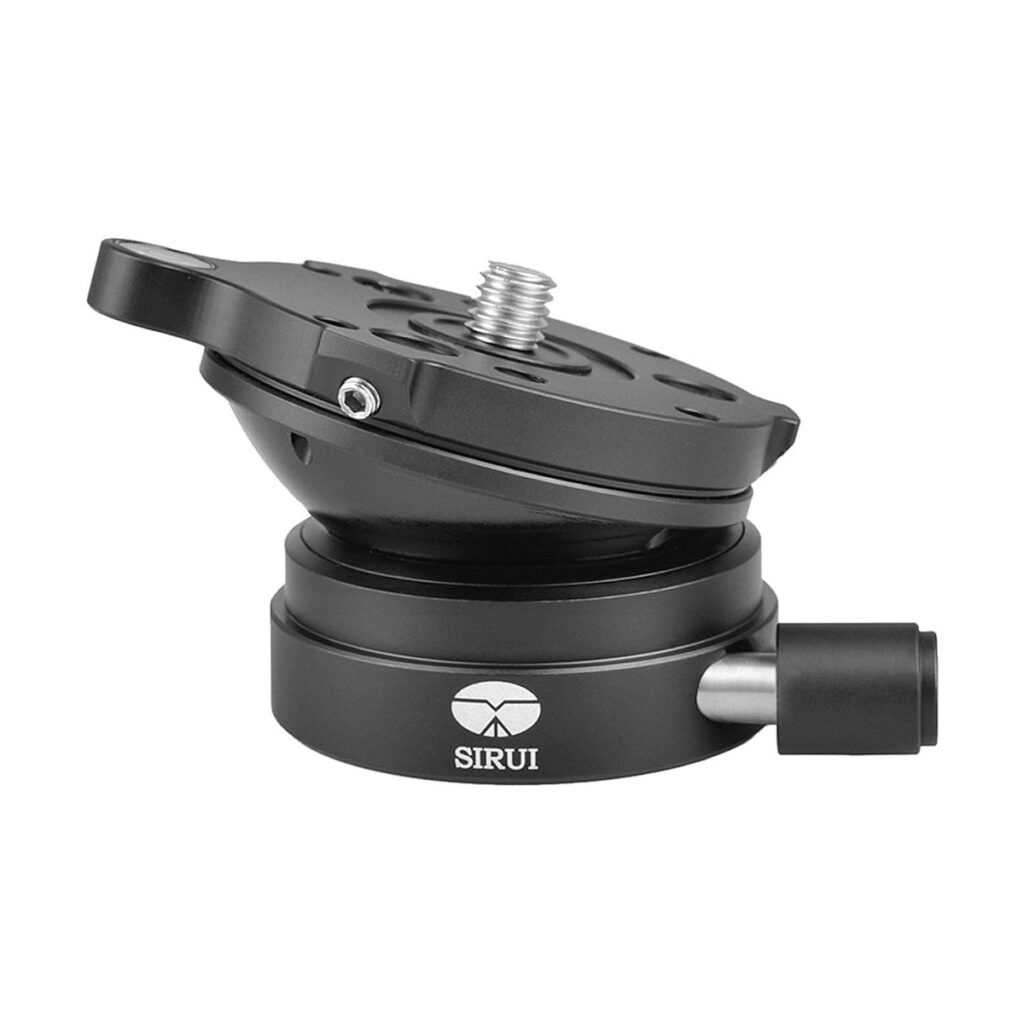 Sirui_LE-60_Leveling_Base_003 The Sirui LE-60 Leveling Base is a black tripod accessory with a round base, an adjustable top plate with a fixing screw and a side-mounted locking knob.