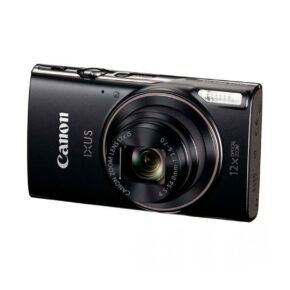 Canon_Ixus_285_SH_001 The black Canon Ixus 285 HS compact camera, with a protruding lens that reads "12x optical zoom", is displayed diagonally against a white background.