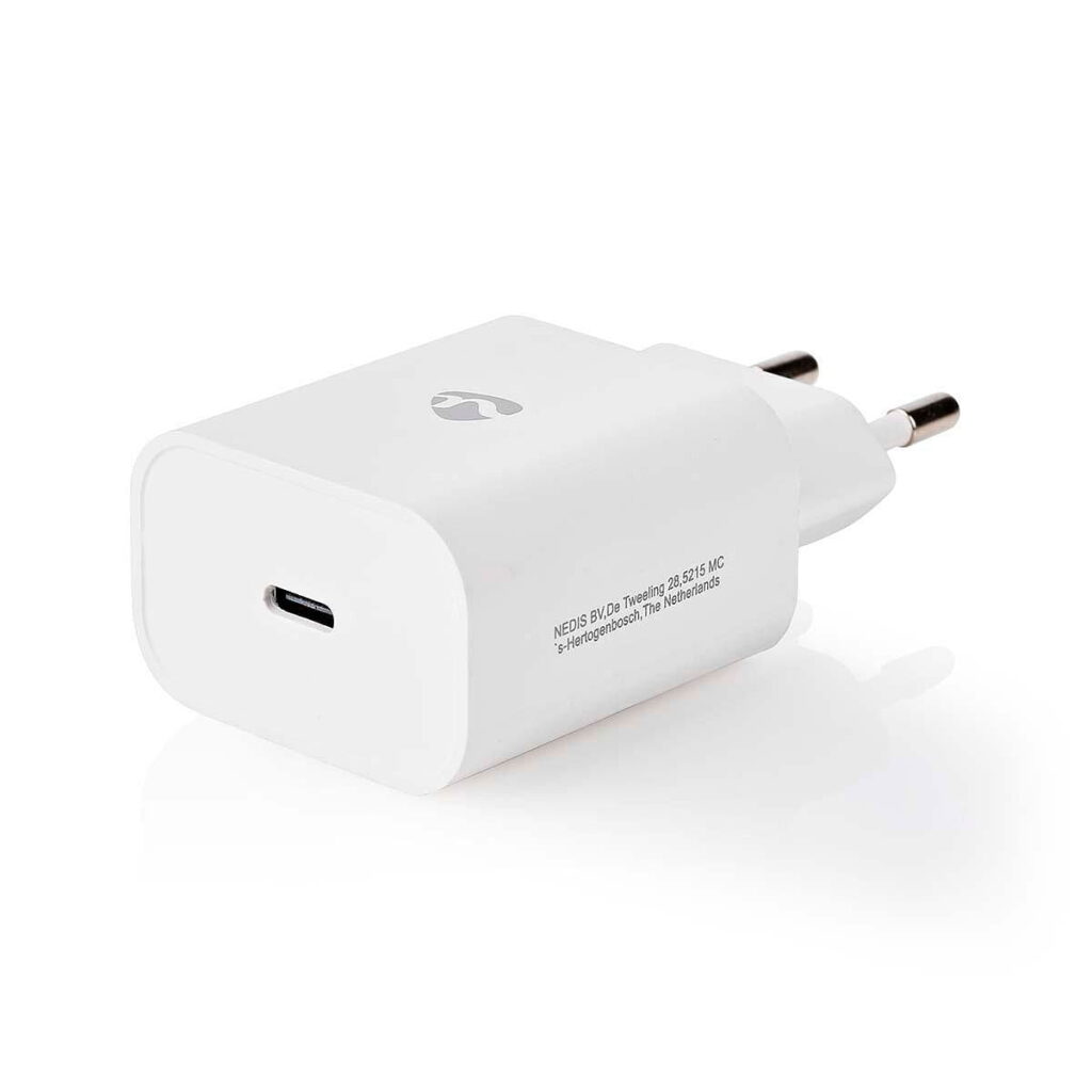 Nedis_Seinälaturi_1-Ulostulo_PD3_0_20W_USB-C_001 Nedis Wall Charger 1-Outlet PD3.0 20W USB-C is a white wall charger with two round metal spikes and a simple design with logo and small printed text on the side on a white background.
