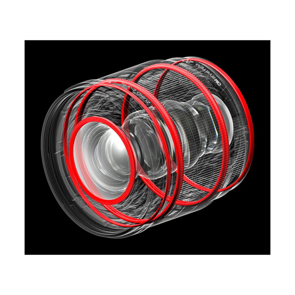 om_systems_20mm_f14_pro_01 Läpinäkyvä 3D-versio OM SYSTEM M.Zuiko Digital ED 20mm f/1.4 PRO -objektiivi -objektiivista, joka paljastaa monimutkaiset lasielementit ja tunnusomaiset punaiset renkaat mustaa taustaa vasten.