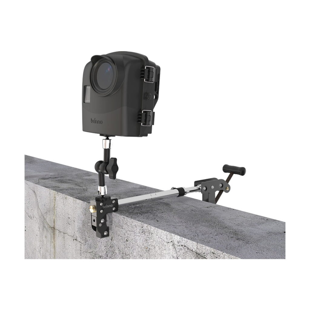 Brinno_ACC1000P_Camera_Clamp_Plus_002 The Brinno ACC1000P Camera Clamp Plus, with adjustable arm and handle for a secure position, is mounted on the edge of a concrete slab to hold a black camera.