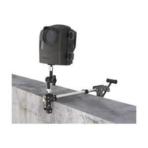 Brinno_ACC1000P_Camera_Clamp_Plus_002 The Brinno ACC1000P Camera Clamp Plus, with adjustable arm and handle for a secure position, is mounted on the edge of a concrete slab to hold a black camera.