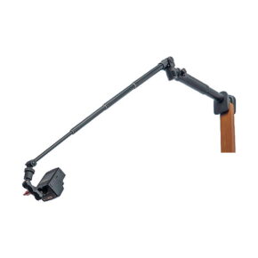 Brinno_BAC_2000_Creative_Kit_001 The Brinno BAC2000 Creative Kit, a black adjustable camera mount arm, is attached to the edge of a wooden surface, with the camera mounted at the end against a white background.
