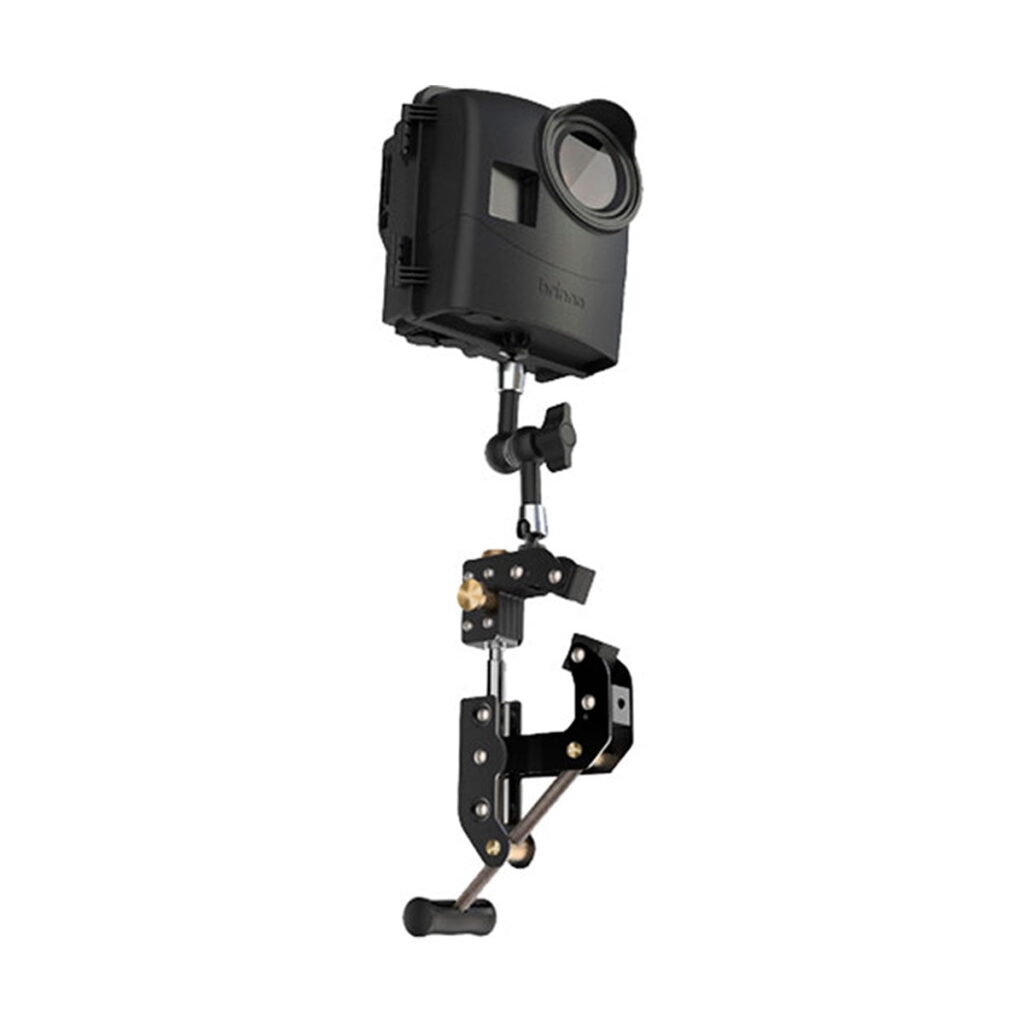 Brinno_BCC_2000_Bundle_Pack_004 The Brinno BCC2000 Bundle Pack includes a black motion camera mounted on an adjustable metal bracket with multiple joints and screws, designed to securely attach to a variety of surfaces or devices.