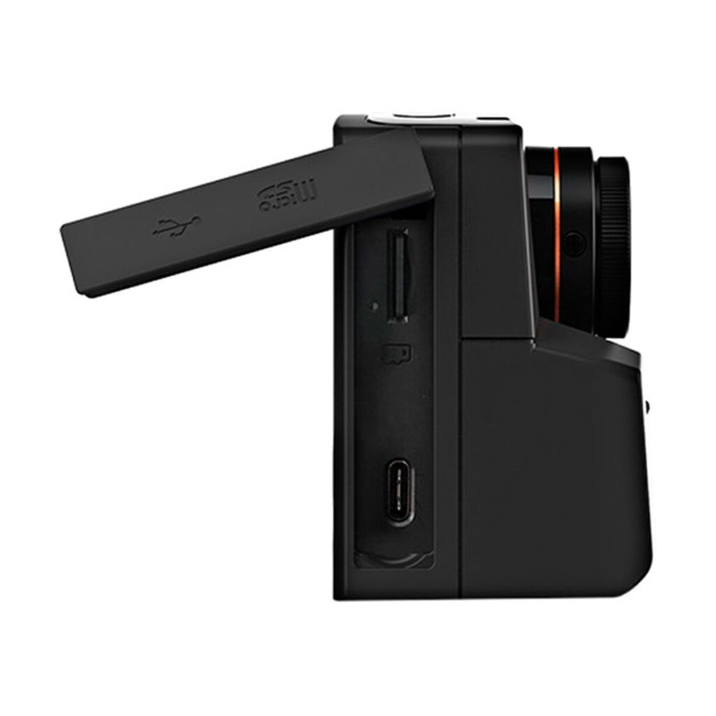 Brinno_TLC_2020_Timelapse_Camera_003 Side view of the Brinno TLC2020 Timelapse camera in black, with the LCD screen flipped out to reveal a memory card slot, USB port and HDMI port. The lens and part of the camera body are also visible.