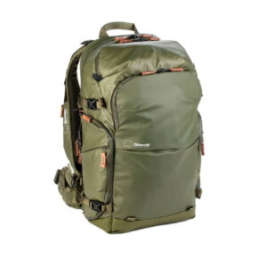 Shimoda_Designs_Explore_v2_35-Vihreä_001 The Shimoda Designs Explore v2 35 camera backpack in green features multiple zippered compartments, adjustable straps and tan zipper pulls - ideal for outdoor adventures or travel.