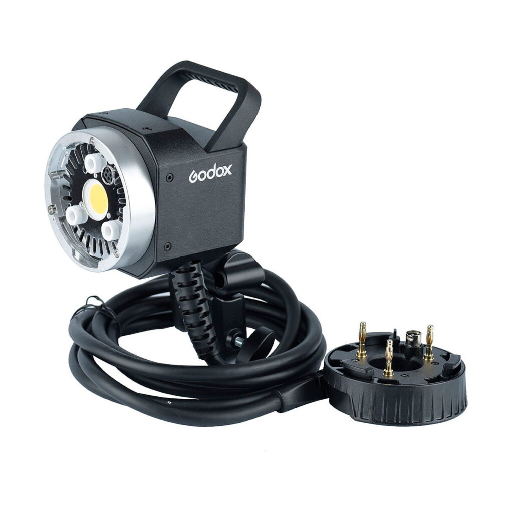 Godox_AD-H400P_Flashhead_Extension_001 Godox AD-H400P Salamapään Jatke-studiovalopää, jossa on kahva ja pitkä musta virtajohto, irrotettuna pyöreästä virtaliittimestä, valkoisella pohjalla.