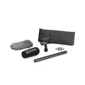 Boya-BY-PWM3000S-2 The Boya BY-PVM3000S XLR Shotgun Condenser Microphone (Short) kit includes a shotgun microphone, foam windscreen, fur windscreen, shock mount, rubber bands and a black bag - all on a white background.