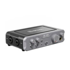 Boya-BY-AM1 The Boya BY-AM1 2-channel XLR mixer has a grey USB audio interface with multiple input/output ports, knobs and switches on the front, and a BOYA logo on the top for professional audio recording and monitoring.