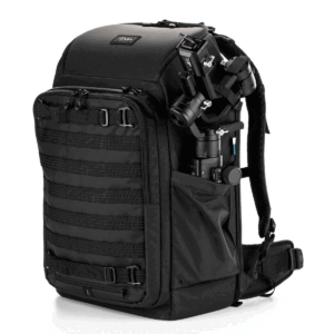 Tenba-Axis-V2-32L-6 The Tenba Axis V2 32L Backpack is a black camera backpack with a side compartment for a mounted gimbal, multiple zippered pockets, adjustable straps and a MOLLE mesh front for accessories.