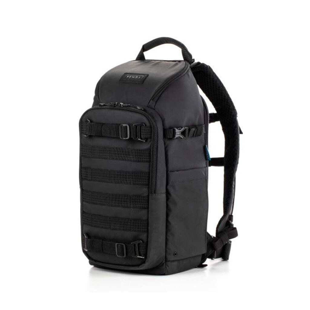Tenba-axis V2-16L The Tenba Axis V2 16L Backpack is a black tactical-style backpack with multiple external straps, buckles and padded shoulder straps, shown vertically on a white background.