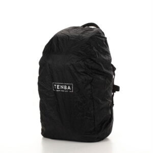 Tenba-axis V2-16L-7 The Tenba Axis V2 16L camera backpack, in black with rain cover, displays the white Tenba logo and the text "New York 1977" on the front against a white background.