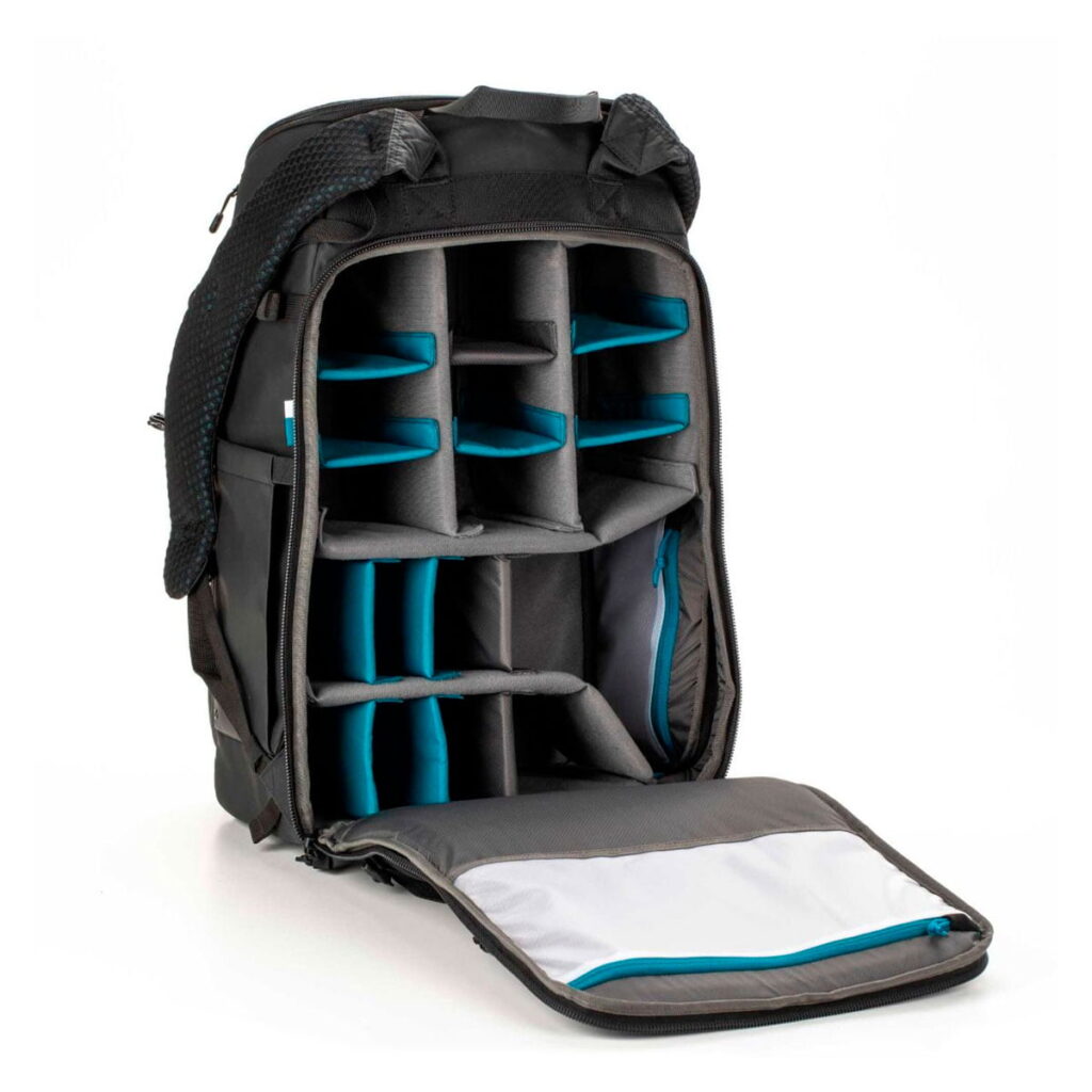 Tenba-axis V2-32L-2 The Tenba Axis V2 32L Backpack is a black backpack with an open main compartment with customizable padded dividers for organizing camera gear or electronics and a mesh pocket inside the front flap.