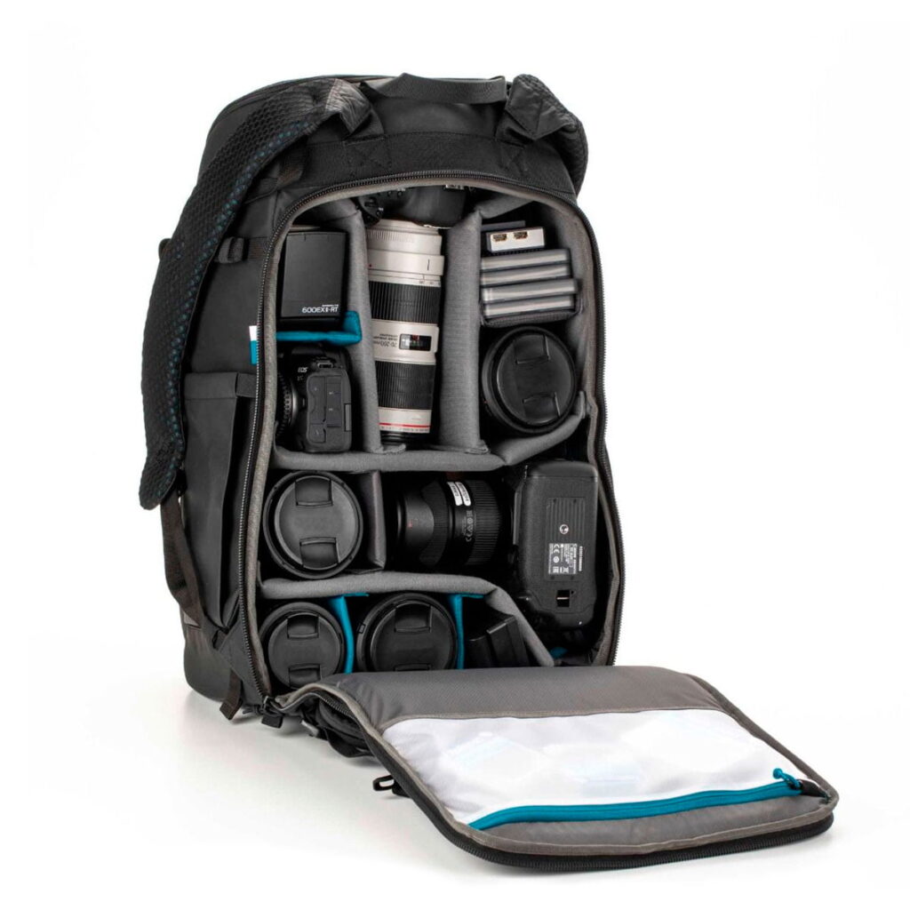 Tenba-axis V2-32L-3 The Tenba Axis V2 32L backpack is pictured in black with the front flap open, and features neatly organised compartments for camera bodies, multiple lenses, batteries, memory cards and accessories.