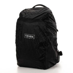 Tenta-axis V2-4 The Tenba Axis V2 24L Backpack is a black camera backpack with a wrinkled design and a white TENBA NEW YORK 1977 logo on the front. It stands upright against a plain white background.