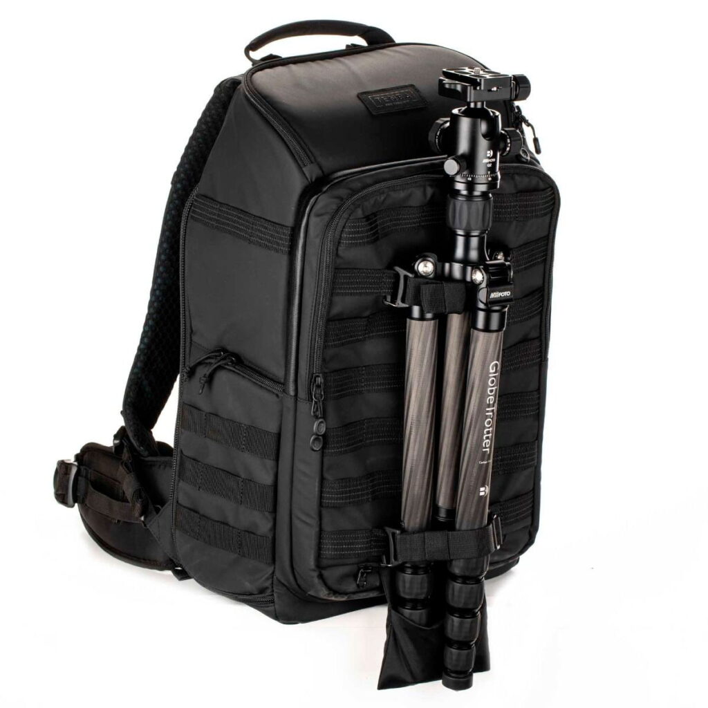 Tenta-axis V2-6 The Tenba Axis V2 24L Backpack is a black camera backpack with multiple compartments and zippers, as well as front straps for tripod attachment.