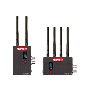 Swit_Flow2000_Tx_Rx_Wireless_SDI_HDMI_Kit_002 Two black Swit Flow2000 Tx+Rx Wireless SDI/HDMI units: the transmitter on the left has two antennas and a small display; the receiver on the right has four antennas and extra connection ports.
