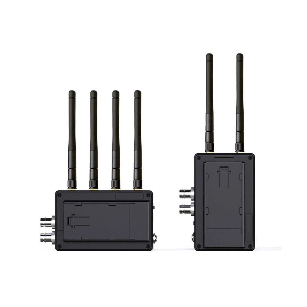 Swit_Flow2000_Tx_Rx_Wireless_SDI_HDMI_Kit_003 The Swit Flow2000 Tx+Rx Wireless SDI/HDMI Kit includes two black units, each with four high antennas and multiple side ports, shown front and side against a white background.