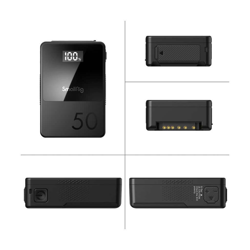 SmallRig_VB50_mini_V-Mount_Battery_3579_005 The SmallRig 3579B V-Mount Battery Mini VB50 is a compact black device with a digital display that reads "100 %", the number 50 on the front and four side images showing its various ports and connectors.