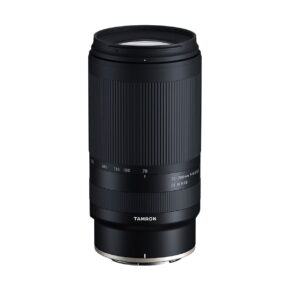 Tamron_70-300mm_Nikon_Z_001 The black Tamron 70-300mm f/4.5-6.3 Di III RXD lens for the Nikon Z stands upright against a white background, showing the zoom and focus rings and lens markings.