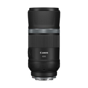 canon_rf_600mm_is_stm_03 The Canon RF 600mm f/11 IS STM lens is shown upright against a white background. The black lens has both textured and smooth parts, and the control switches are visible on the side.