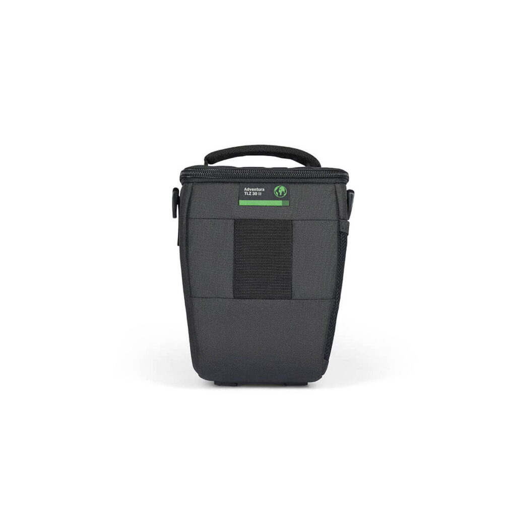 lowepro_tlz_30_iii_02 The Lowepro Adventura TLZ 30 III is a black camera lens case with a textured top handle, green and white label and front pocket, shown on a white background.