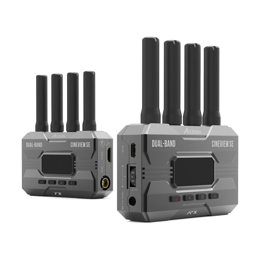 Accsoon_Cineview_SE_003 Two grey Accsoon CineView SE WiFi Transmission SDI/HDMI wireless transmitters, each with four black antennas, are displayed from different angles and feature ports, buttons, an LCD display and "CineView SE Dual-Band" labelling.