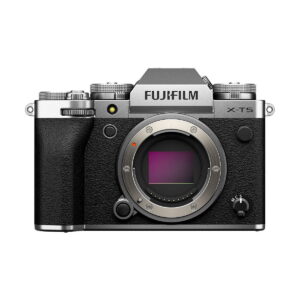 Fuji_X-T5_Hopea_001 Fujifilm X-T5 system camera, silver, mirrorless camera body in silver and black, without lens attached, front view showing sensor and controls.