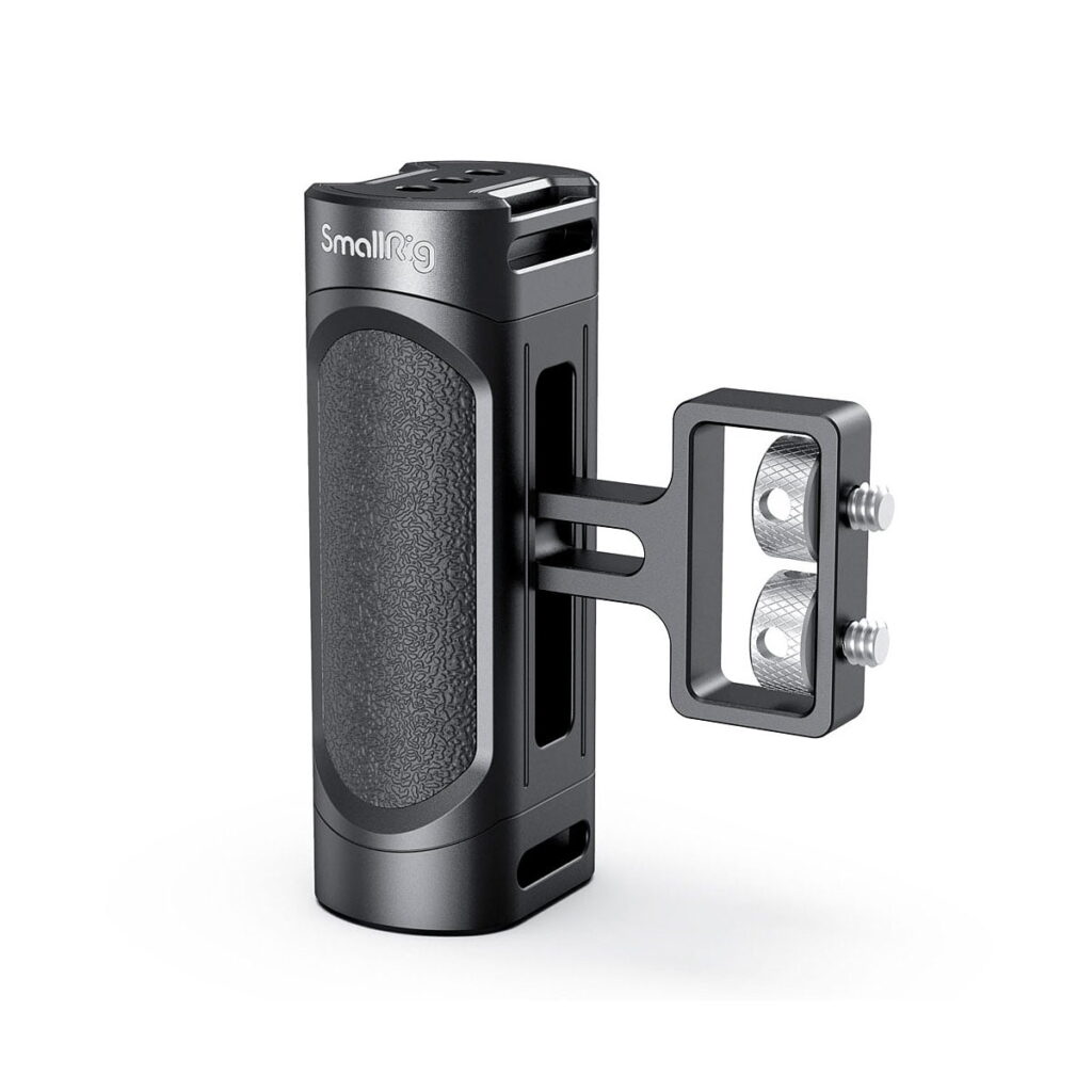 SmallRig_Mini_Side_Handle_1_4-20_Screws_2916_001 SmallRig 2916 Mini Side Handle (1/4"-20 screws) is a black, cylindrical camera handle with textured rubber insert and metal mounting bracket, shown in white on the picture.