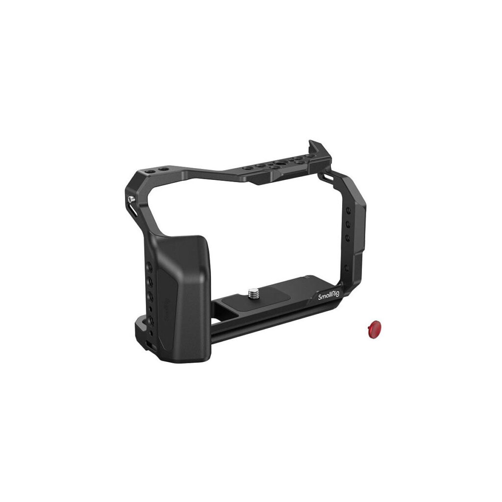 SmallRig_Multifunctional_Cage_for_FUJIFILM_X-T5_4135_006 The SmallRig 4135 Cage for Fujifilm X-T5 is a black metal camera cage with textured grip and mounting points, and features a separate small red screw for mounting the X-T5 and accessories.