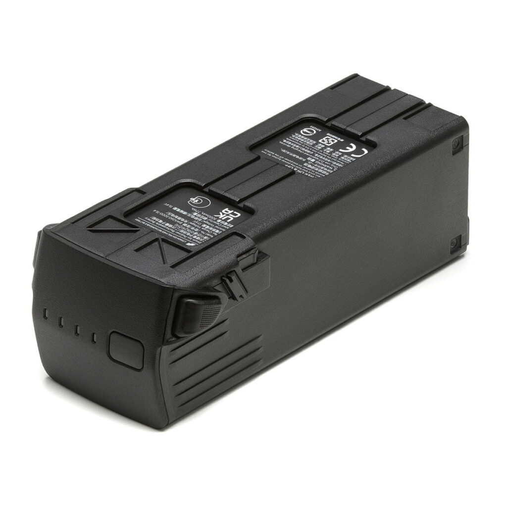 dji_mavic3_battery DJI Mavic 3:n akku -akku, musta ja suorakulmainen, jossa on merkkivalot ja varoitustarrat päällä, kuvattu valkoisella taustalla.