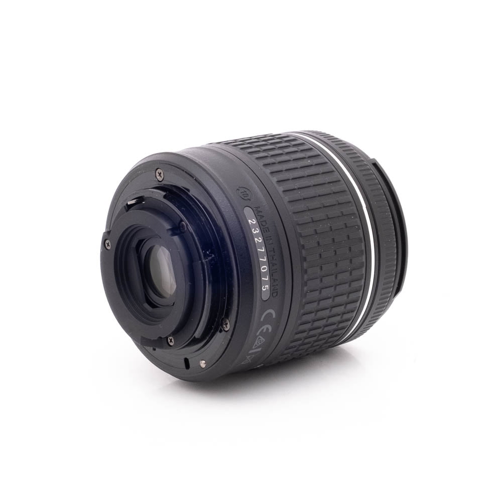 Nikkor 18-55 f35-56G DX VR-1 Nikon D3500 + 18-55 f/4.5-6.3G DX VR (SC 31000) - Käytetty