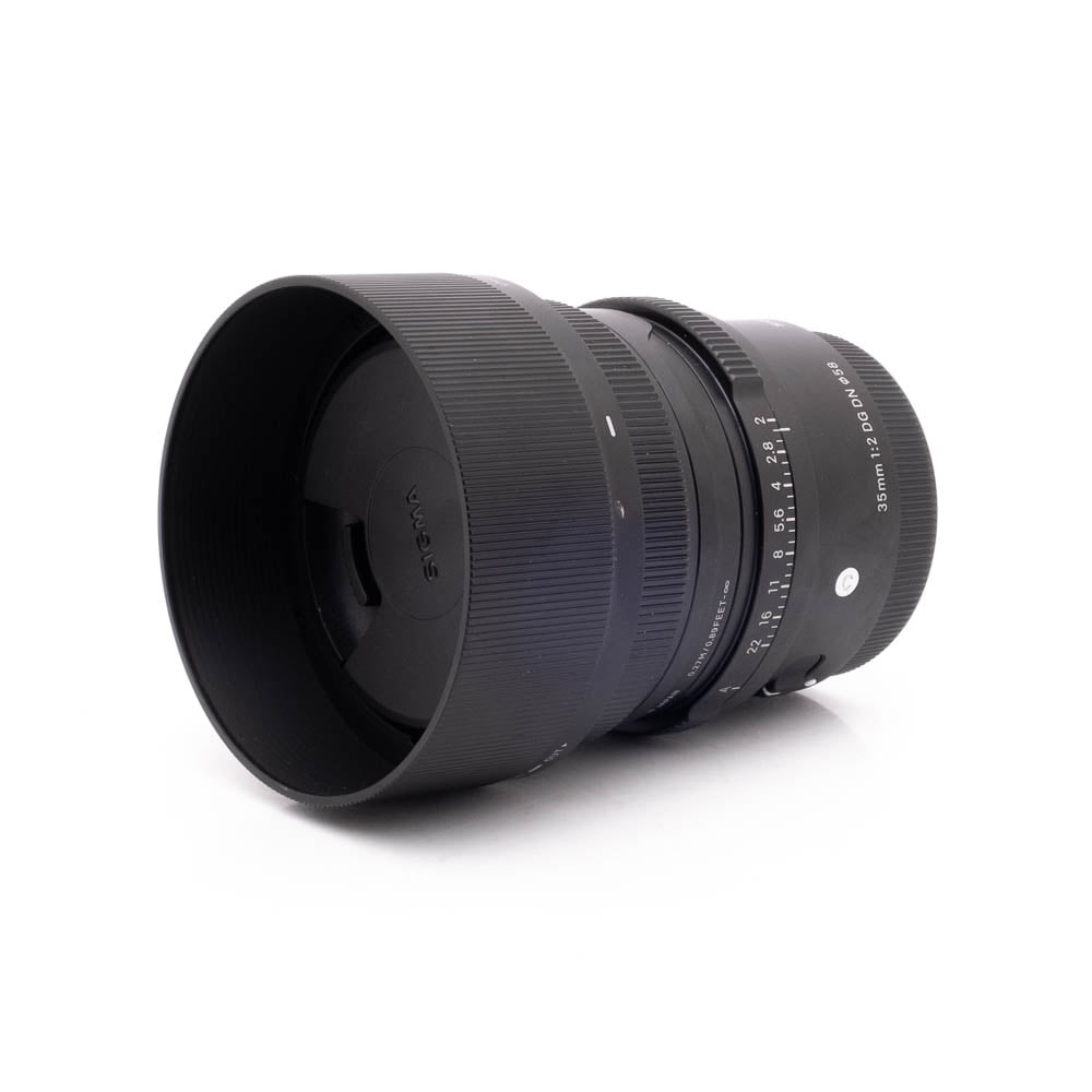 Sigma C 35mm DG DN Sony-3 Sony FE 50mm f/1.8 - Käytetty